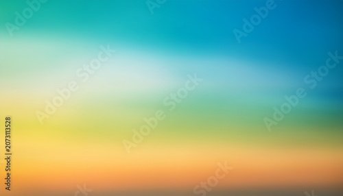 A Blurred Ombre Background In Shades Of Blue Green Yellow And Orange