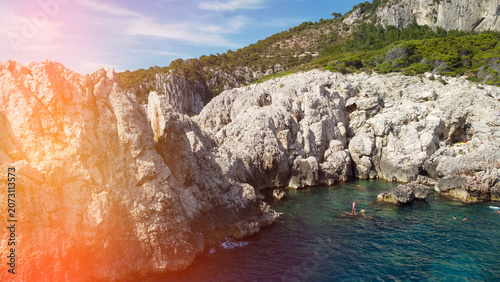 Εκτύπωση καμβά Beautiful aerial view of Capri lighthouse coastline beach with sunbathers and tu