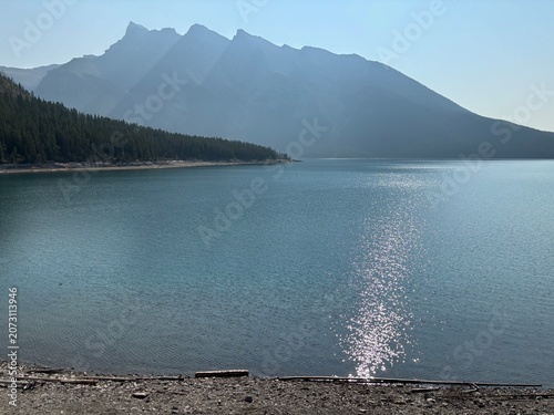 Sunlight Reflection On A Mountain Lake In The Canadian Rockies