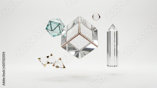 Floating geometric glass shapes with gold accents on white background