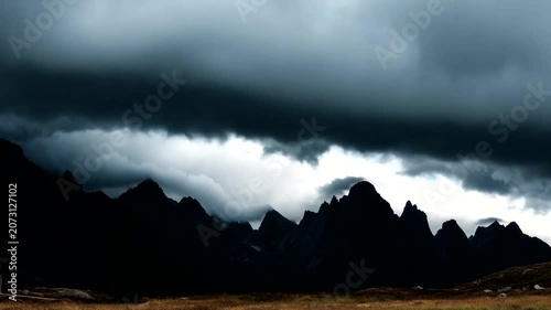 Dramatic Mountain Landscape Under Stormy Skies