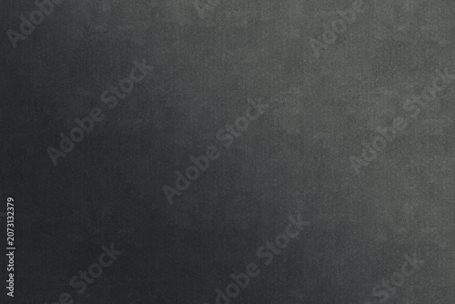 Fotografía A solid charcoal grey background featuring a subtle, fine-grained texture and a clear, perceptible smooth gradient