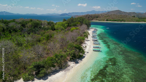 фотографія Drone perspective of Gili Nanggu island showing beach and crystal clear waters I