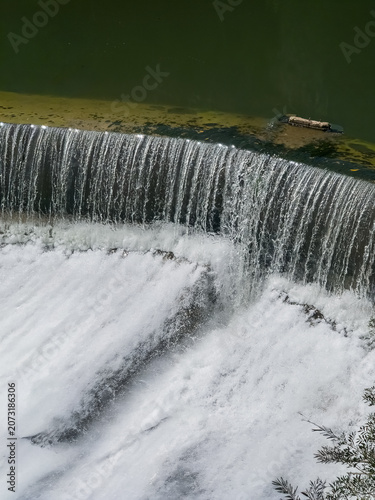 Flow from a river dam serving a textile mill