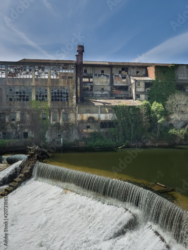 Abandoned textile mill by the Nabao river in Portugal