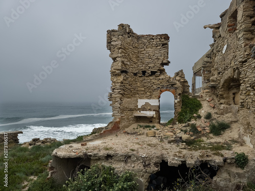 Ruined abandoned building by the Atlantic oceas in Portugal