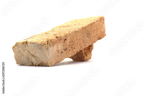 Принти на полотні Traditional bricks on a white background for wall construction.