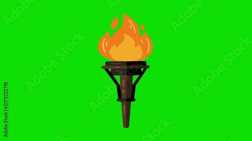 A large torch with a flame burns brightly on a green screen background.