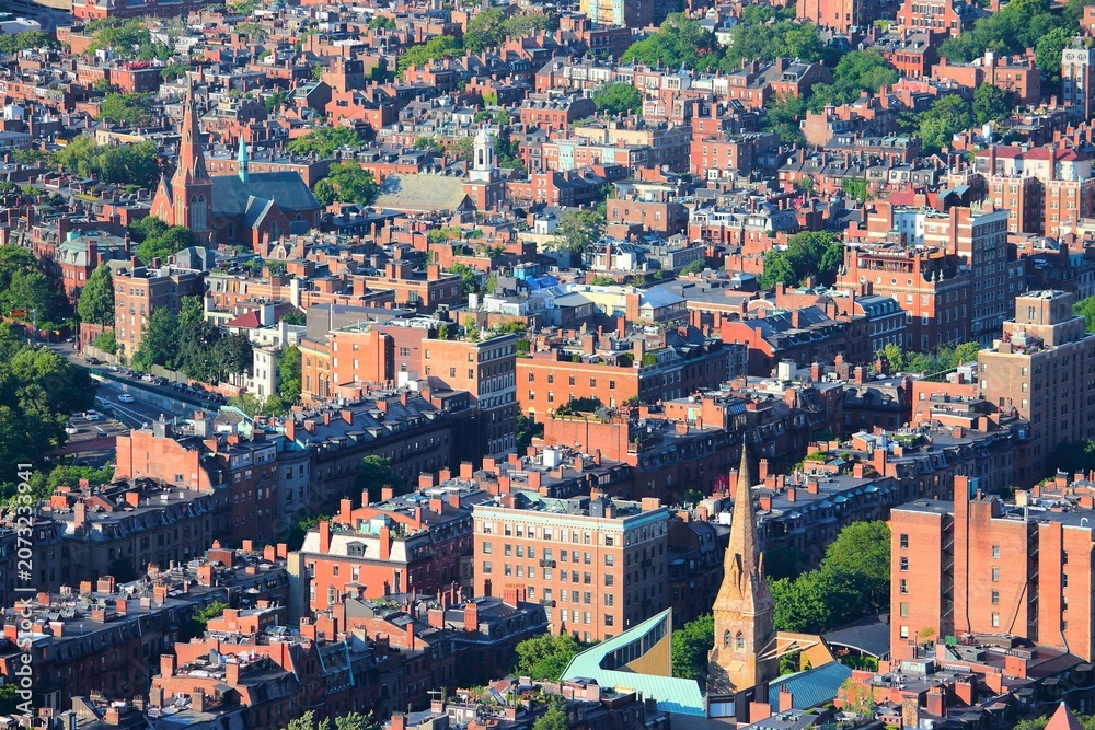 Fototapeta premium First Church in Boston, Unitarian Universalist Church (in foreground) - cityscape of Boston Back Bay.