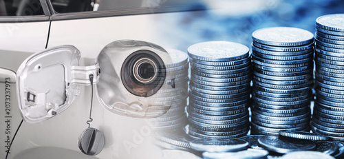 Принти на полотні Open fuel filler and stacks of coins concept