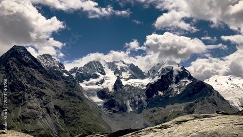 Majestic Alpine Glacier Peaks with Fast Moving Clouds - Mountain Timelapse
