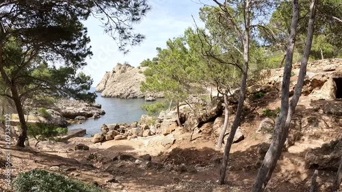 POV Walk Down a Steep Rocky Coastal Path Arriving at a Secluded Cove, Mallorca, Spain