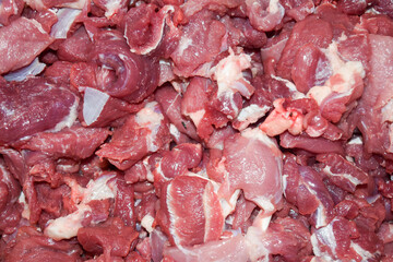 piles of raw and fresh lamb or goat meat obtained during Eid al-Adha in Indonesia.