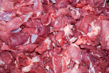 piles of raw and fresh lamb or goat meat obtained during Eid al-Adha in Indonesia.