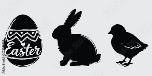 Easter egg with hearts and text beside a bunny and chick silhouette during spring celebration
