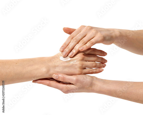 Foto Close-up of hands applying white cream isolated on png transparent background is