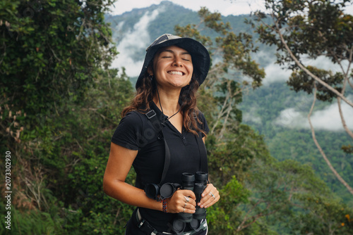 Young female birdwatcher portrait