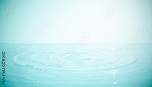 Calm water surface with soft ripples and clean blue sky background 穏やかな水面と柔らかな波紋のクリーンな青い背景