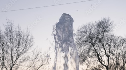 fountain jet shoots up, close-up, slow motion
