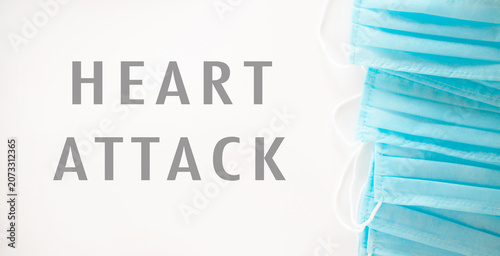 Medical masks stacked illustrating heart attack awareness