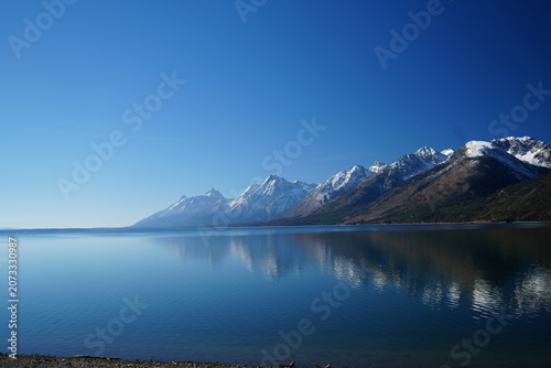 Grand Teton Mountains Reflected in Calm Jackson Lake, Wyoming, USA