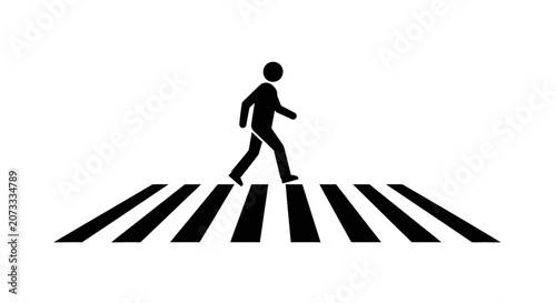 Person walking across a crosswalk on a white background