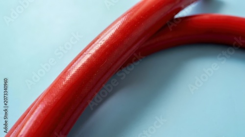 Close up of red chili peppers on a blue background.