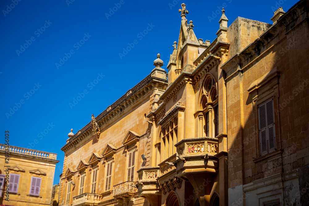 Fototapeta premium Historic fortified city of Mdina with ancient stone walls and architecture in Malta