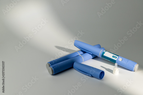 Bild auf Leinwand Horizontal close look of blue semaglutide medication pens for insulin control an