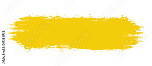 Foto Yellow brush stroke with textured edges on a pure white background