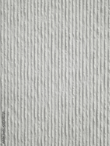 Foto Background of the light gray cement wall texture is rough and striped with a vertical strip pattern