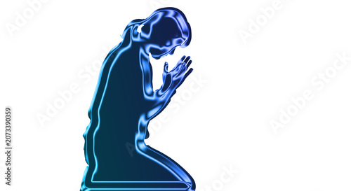 Fotografie A person kneels in prayer with hands clasped in front
