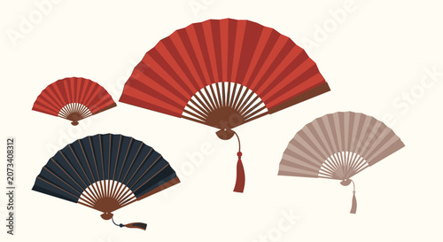 Traditional oriental folding fans in red, black, and beige colors are displayed against a light cream background.