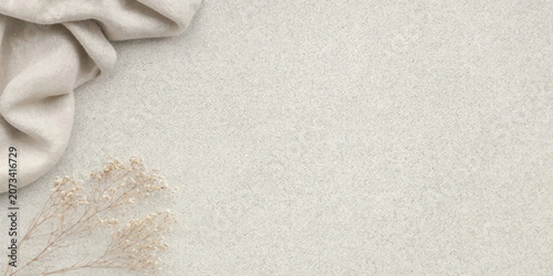 Textured beige fabric background with dried twigs decoration flat lay background minimalist backdrop copy space interior lifestyle decoration