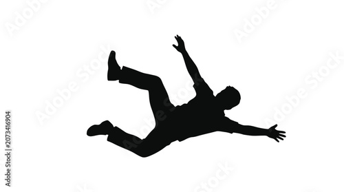A dark silhouette of a man falling through the air with arms and legs outstretched wide