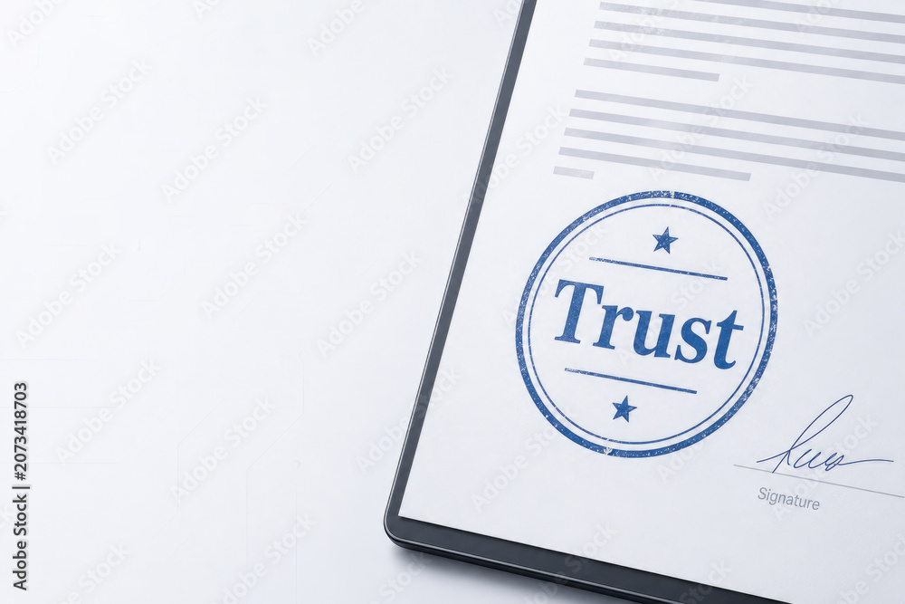 Fototapeta premium Digital document shows a blue trust stamp and signature. Space for text.