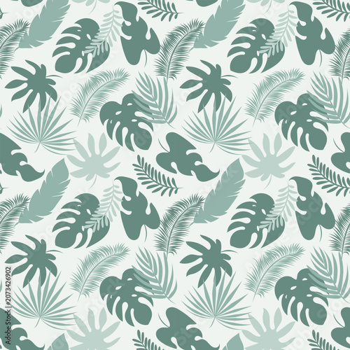 Monochrome tropical leaves seamless pattern with monstera and palm foliage