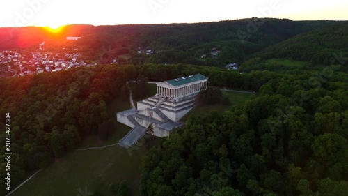 Spectacular sunset over the Walhalla monument in Donaustauf. A majestic drone shot of the Greek-style hall of fame by the Danube river. Sonnenuntergang an der Walhalla im Landkreis Regensburg.