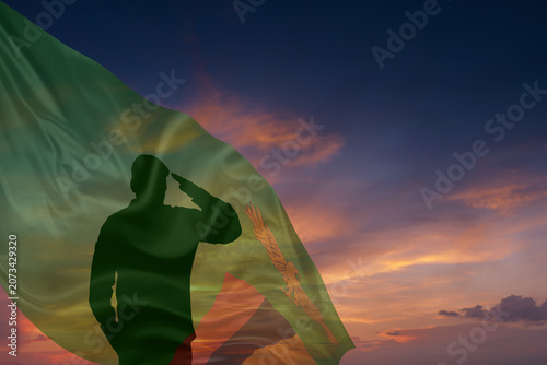 Foto Silhouette of military mans and National flag of Zambia