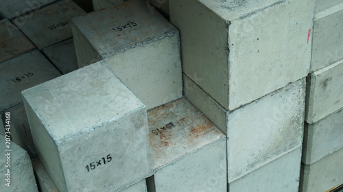 Stacked concrete cube test specimens close-up