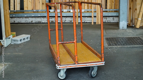 Heavy duty industrial platform trolley for lumber and boards at a store