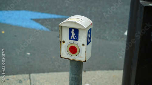 Pedestrian push button switch for visually impaired people on a street