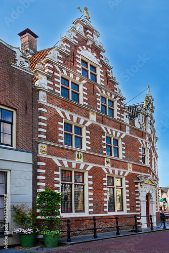 Monumental Statenlogement beautiful historic building from Dutch renaissance period; was built in 1613 with double stepped gables. Hoorn, the Netherlands.