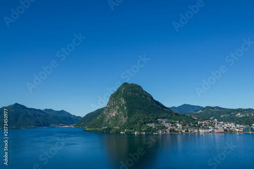 Open panorama of Monte San Salvatore and Lake Lugano from Parco San Michele