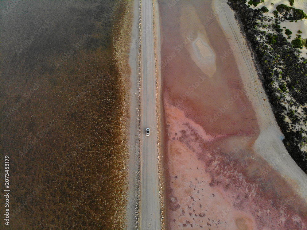Naklejka premium Australia, Lake MacDonnell in Eyre Peninsula is the most famous salt lake in South Australia. This stunning lake near Penong has an incredible pink colour, making it a truly unique sight to see.