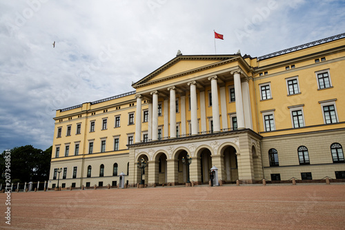 Norway's Royal Palace: Grand Neoclassical Architecture, Guards, and Flag