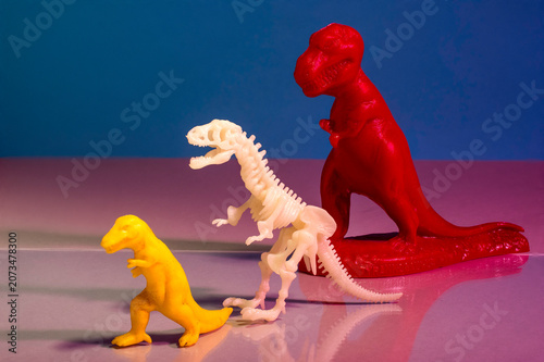 Vintage and Museum Toy Tyrannosaurus Rex Figures on White Background — Dinosaur Collection Studio Photography