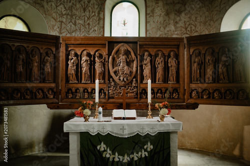 Canvastavla Carved wooden altarpiece in a historic church