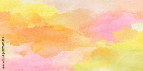 Quadro su tela A vibrant watercolor splash featuring soft pastel hues of yellow, pink, and orange, creating a dreamy and abstract background with a textured feel