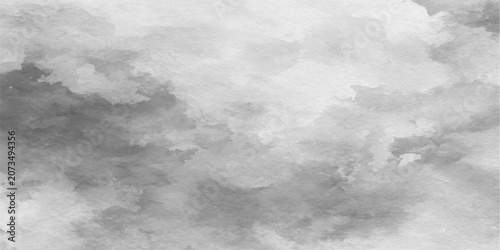 Fotografie Dramatic grey clouds fill the frame, creating a sense of foreboding or anticipation with their textured, painterly appearance